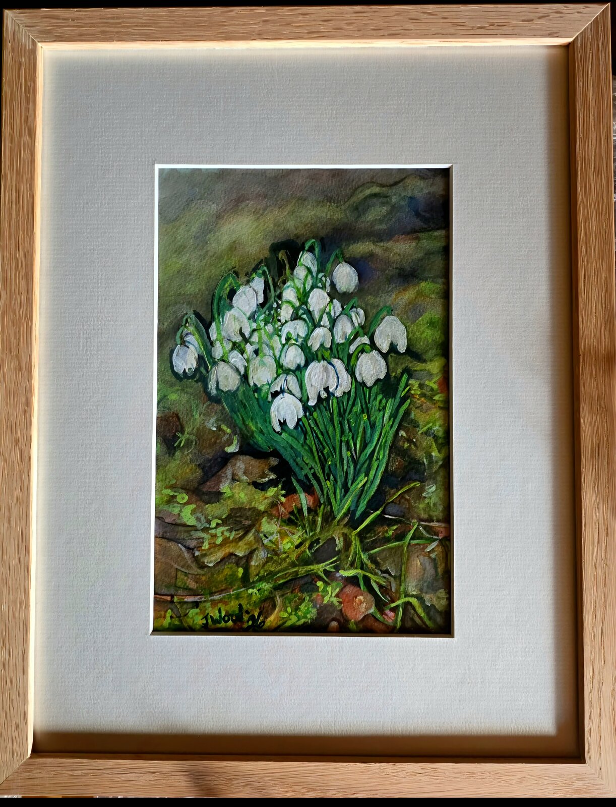 The painting in its frame.